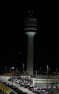 Orlando International Airport (MCO) - A view of MCO's tower at night. - by Kreg Anderson