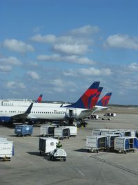 Orlando International Airport (MCO) - A row of Delta tails at MCO. - by Kreg Anderson