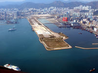 Kai Tak Airport (closed 1998), Kowloon Hong Kong (VHHX) - View from 1500ft entering the Harbour on Hong Kong Flying club C182 - by A Marignier