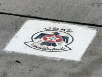 Nellis Afb Airport (LSV) - USAF Thunderbirds placard on the tarmac. - by Brad Campbell
