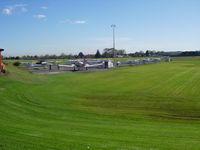 Ardmore Airport, Auckland New Zealand (NZAR) - View of flying club apron from within central area.
Great airport for viewing and photos - lots of places to park up. - by magnaman