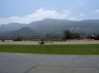 Santa Paula Airport (SZP) - T-REX radio-controlled helicopter flying downwind - by Doug Robertson