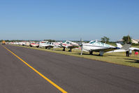 Fond Du Lac County Airport (FLD) - Visitors at Fond Du Lac during 2011 Oshkosh Week -
a FREE bus is available to pilots AND enthusiasts during this week - by Terry Fletcher