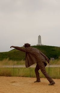 First Flight Airport (FFA) - Sculpture of Wilber Wright at the 1903 Wright Flyer Sculpture at the Wright Brothers National Memorial, Kill Devil Hills, NC - by scotch-canadian