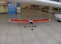 Santa Paula Airport (SZP) - 'N40TT' TIGER Trainer radio-controlled, diesel engine with preheat, under wing of N110AM Moravan Zlin Z242L - by Doug Robertson