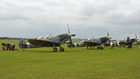Duxford Airport, Cambridge, England United Kingdom (EGSU) - SPITFIRES ON THE FLIGHTLINE - by Martin Browne