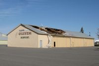 Olivia Regional Airport (OVL) - Damaged hangar from a storm this summer at the Olivia Municipal Airport in Olivia, MN. - by Kreg Anderson