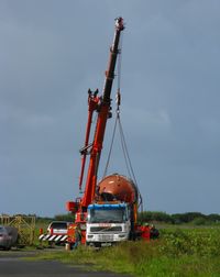 Swansea Airport, Swansea, Wales United Kingdom (EGFH) - Rolls-Royce RB 211 Turbofan from a former TWA Lockheed TriStar being removed from the airport. - by Roger Winser