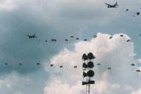 James M Cox Dayton International Airport (DAY) - C-130s and C-141s drop parachutes at Dayton Airshow 1994 to commemorate 50th Anniversary of D Day - by Florida Metal
