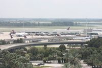 Orlando International Airport (MCO) - Delta and Air Tran planes around Airside 4, some at hardstands due to cancellations in the northeast from Hurricane Irene - by Florida Metal
