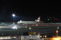 Vienna International Airport, Vienna Austria (LOWW) - Saudi Arabian Airlines MD-11 with an Asiana Boeing 747 - by Thomas Ranner