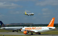 Edinburgh Airport, Edinburgh, Scotland United Kingdom (EGPH) - United B757-224 N19141 And Easyjet A320 G-EZTN Waiting for German wings A319 D-AGWM To land on runway 06 - by Mike stanners