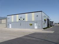 Santa Paula Airport (SZP) - Large deluxe newer hangar of Mysterious Legendary Fliers-In Our Own Mind-on Curtiss Taxi, with living quarters midfield location FOR SALE - by Doug Robertson