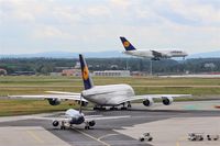 Frankfurt International Airport, Frankfurt am Main Germany (EDDF) - Inbound traffic on rwy 25L observed by outbound traffic at holding point 25C...... - by Holger Zengler