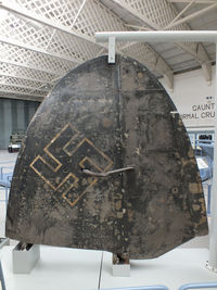 Duxford Airport, Cambridge, England United Kingdom (EGSU) - Heinkel HE 111E tail fin recovered from Storvatnet Lake, Norway in 1974. Displayed at the IWM Duxford - by Chris Hall