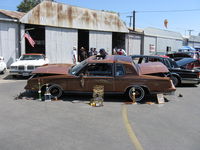 Santa Paula Airport (SZP) - First Sunday Aviation Museum Open House & Fly-In invites car clubs-this is a 1982 Oldsmobile Cutlass Supreme club coupe extensively customized. Tilted for viewing. - by Doug Robertson