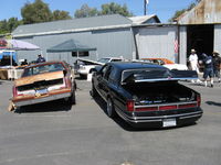 Santa Paula Airport (SZP) - First Sunday Aviation Museum of Santa Paula Open House & Fly-In invites car clubs-unusual Lincoln Town Car with hydraulics in trunk for jacking up or down-or bouncing the car!  - by Doug Robertson