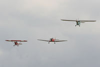 EGBR Airport - from L to R, Luton LA4A Minor G-ATCN, Dart Kitten II G-AEXT and Aeronca 100 G-AEVS at the Real Aeroplane Club's Summer Madness Fly-In, Breighton - by Chris Hall