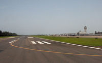 Luis Muñoz Marín International Airport, San Juan Puerto Rico (TJSJ) - This is a view of the northern side of SJU, at the threshold of Runway 8L.  I was surprised to see the C-17, as there is a military depot to the east. - by Daniel L. Berek