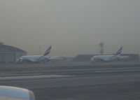 Dubai International Airport, Dubai United Arab Emirates (OMDB) - two Emirates A380s - by Thomas Ranner