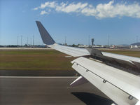 Cairns International Airport, Cairns, Queensland Australia (YBCS) - shorlty after touchdown - by Thomas Ranner