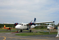 Stroudsburg-pocono Airport (N53) - A Twin Otter, Short Skyvan, and Cessna Skylane share the J R S Sky ramp at Stroudsburg-Pocono Airport; the turboprops are used for skydiving. - by Daniel L. Berek