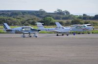 Swansea Airport, Swansea, Wales United Kingdom (EGFH) - Visiting and resident aircraft at Swansea Airport. - by Roger Winser