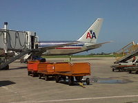 Port-au-Prince International Airport (Toussaint Louverture Int'l), Port-au-Prince Haiti (MTPP) - Boarding at American Airlines Aircraft at the Toussaint Louverture International Airport of Port-au-Prince - by Jonas Laurince