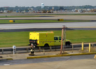 Hartsfield - Jackson Atlanta International Airport (ATL) - Yellow truck - by Ronald Barker