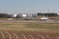 Charlotte/douglas International Airport (CLT) - US Air stacked up and ready to go - by J.B. Barbour