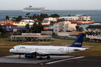 Princess Juliana International Airport, Philipsburg, Sint Maarten Netherlands Antilles (SXM) - A320 Jetblue with Norwegian Sun in the background - by Wolfgang Zilske