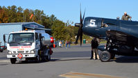 Culpeper Regional Airport (CJR) - Fuel truck refueing F4U-4NL - Culpeper Air Fest 2012 - by Ronald Barker