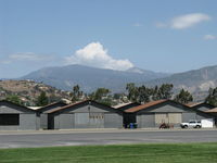 Santa Paula Airport (SZP) - Cumulus cloud building beyond 6,704' Hines Peak - by Doug Robertson