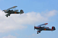 Sleap Airfield Airport, Shrewsbury, England United Kingdom (EGCV) - CASA 1-131E Jungmann's G-BZJV and G-CDJU displaying at the Vintage Aircraft flyin, Sleap - by Chris Hall