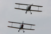 Sleap Airfield Airport, Shrewsbury, England United Kingdom (EGCV) - CASA 1-131E Jungmann's G-BZJV and G-CDJU displaying at the Vintage Aircraft flyin, Sleap - by Chris Hall