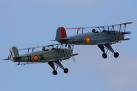 Sleap Airfield Airport, Shrewsbury, England United Kingdom (EGCV) - CASA 1-131E Jungmann's G-BZJV and G-CDJU displaying at the Vintage Aircraft flyin, Sleap - by Chris Hall