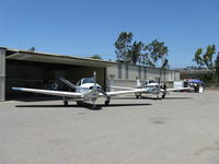 Santa Paula Airport (SZP) - Aviation Museum of Santa Paula, First Sunday Open House & Fly-In. Beech Bonanzas on display at Museum Ramp. 1964 N541DB S35 and 1967 N599DS E33A. - by Doug Robertson