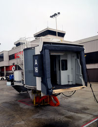 Hartsfield - Jackson Atlanta International Airport (ATL) - Passenger loading ramp Gate A-16 pulled back, ready for departure.  Atlanta - by Ronald Barker