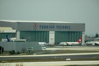 Istanbul Atatürk International Airport - Taken through glass from the Radisson Blu hotel. - by Carl Byrne (Mervbhx)