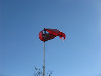 Santa Paula Airport (SZP) - Rwy 04 Windsock, a bit tattered in strong santana wind gusts-since replaced with new - by Doug Robertson