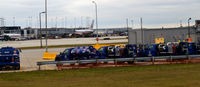 Chicago O'hare International Airport (ORD) - Line of American fuel trucks at O'Hare - by Ronald Barker