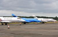 Bournemouth Airport, Bournemouth, England United Kingdom (EGHH) - M-OOUN and friends on JETS apron - by John Coates