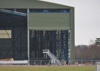 Bournemouth Airport, Bournemouth, England United Kingdom (EGHH) - Interesting door type on new hangar extensions. - by John Coates