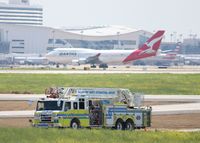 Dallas/fort Worth International Airport (DFW) - DFW's finest with a Qantas 747 taxiing to its gate after landing.  - by paulp