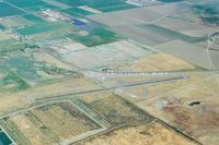 Gustine Airport (3O1) - Gustine around 2005. Looking to the north.The original runway paralleled  the hangars and was much shorter.The gas island is on the west end of the old runway. - by S B J