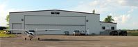 Pembina Municipal Airport (PMB) - A view of the terminal and main hangar building in Pembina, ND. - by Kreg Anderson
