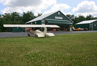 Merritt Field Airport (4PN7) - Merritt Field, located in beautiful Sullivan County, PA, is home to the Eagle's Mere Air Museum, which uses most of the hangar buildings and owns the beautiful little Pietenpol Aircamper in the foreground. - by Daniel L. Berek