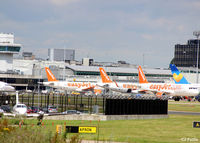 Manchester Airport, Manchester, England United Kingdom (EGCC) - A Swarm of Tails at Manchester Airport EGCC - by Clive Pattle