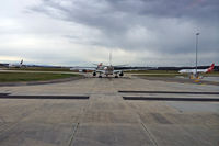 Melbourne International Airport, Tullamarine, Victoria Australia (YMML) - Threatening dark skies at Tullamarine - by Micha Lueck
