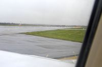 Manchester Airport, Manchester, England United Kingdom (EGCC) - A wet arrival back into MAN - by Guitarist